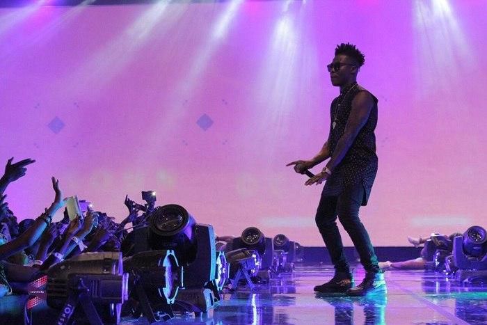 Reekado Banks during a live performance.