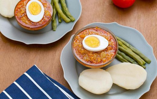 Garden egg stew and boiled potatoes
