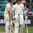 Australia's batsman Adam Voges (L) has been diagnosed with concussion
