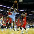 Malik Beasley of the Denver Nuggets shoots over Terrence Jones of the New Orleans Pelicans at the Smoothie King Center in New Orleans, Louisiana