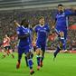Chelsea's striker Diego Costa (C) celebrates scoring their second goal with midfielder Victor Moses (L) and defender Marcos Alonso (2ndL) on October 30, 2016