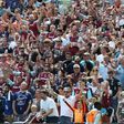 West Ham fans cheer as bubbles fill the air before the kick off of the pre-season friendly football match
