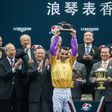Hong Kong-based jockey Joao Moreira (C) is no stranger to the podium