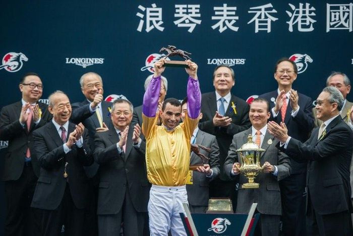 Hong Kong-based jockey Joao Moreira (C) is no stranger to the podium
