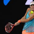 Germany's Angelique Kerber hits a return against Coco Vandeweghe of the US during their women's singles fourth round match at the Australian Open tennis tournament January 22, 2017