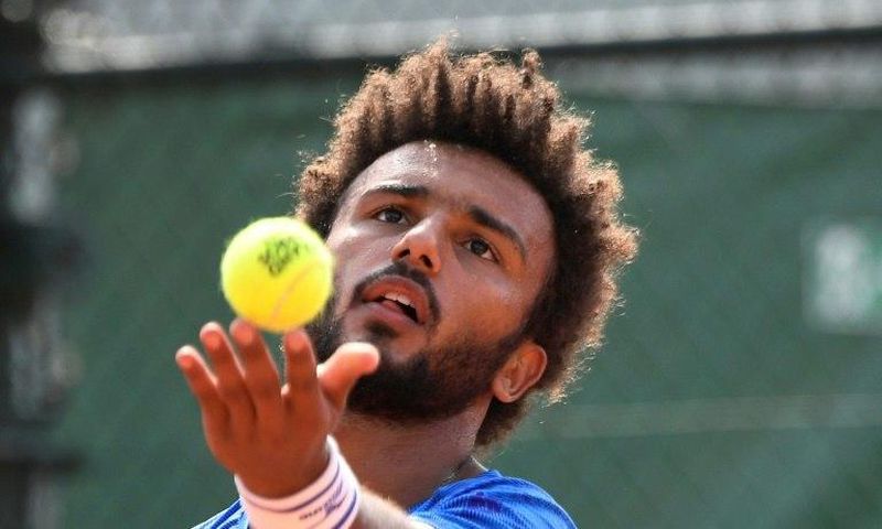 France's Maxime Hamou grabbed Eurosport journalist Maly Thomas around the neck and shoulders while she interviewed him following his first-round defeat on Monday