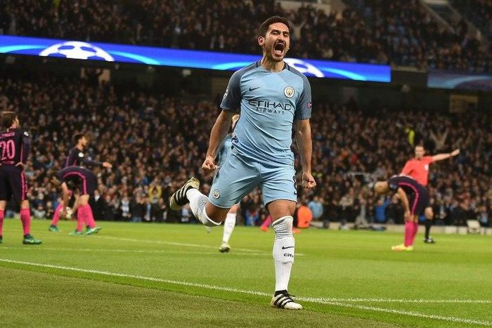 Ilkay Gundogan celebrates after scoring Manchester City's first goal against Barcelona at the Etihad Stadium on November 1, 2016