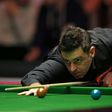 England's Ronnie O'Sullivan plays a shot during his first round match against China's Liang Wenbo during the Masters Snooker tournament at Alexandra Palace in London, on January 15, 2017