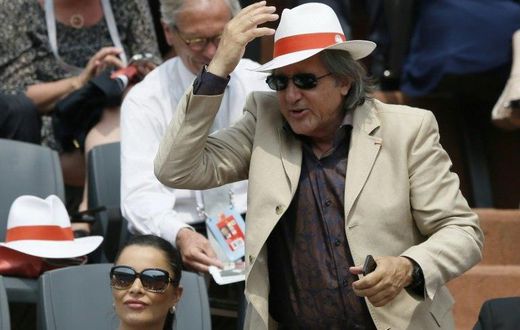According to reports, Romanian former tennis player Ilie Nastase (R), pictured in June 2013, swore at the umpire, then Britain's pregnant captain Anne Keothavong and their number one player Johanna Konta