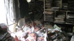 Man who owned SIX TONS of porn dies when filthy magazine collection fatally falls on top of him