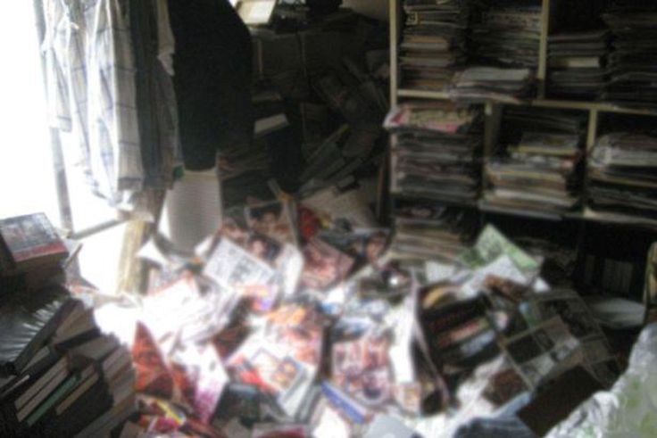 Man who owned SIX TONS of porn dies when filthy magazine collection fatally falls on top of him