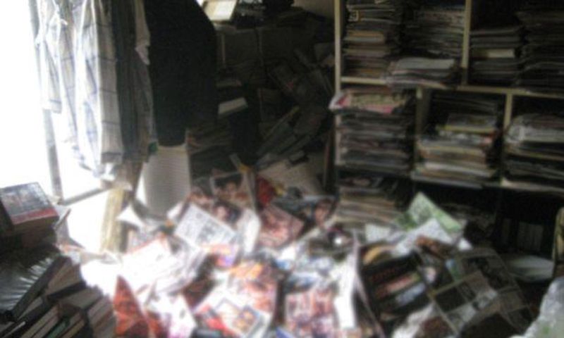 Man who owned SIX TONS of porn dies when filthy magazine collection fatally falls on top of him
