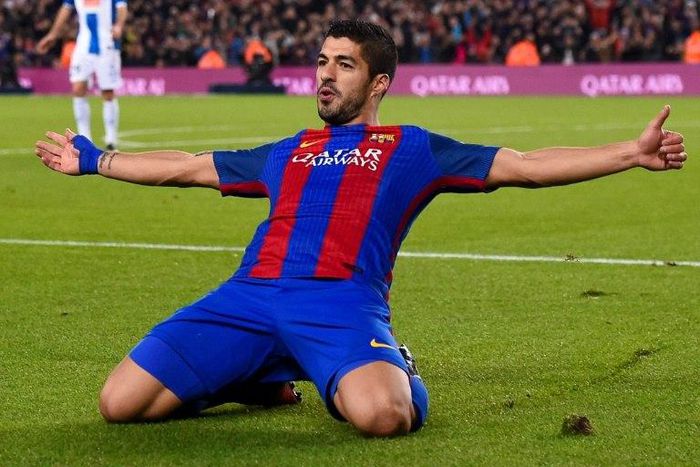 Barcelona's forward Luis Suarez celebrates a goal on December 18, 2016
