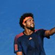 France's Jo-Wilfried Tsonga serves against Switzerland's Stan Wawrinka during their quarter-final at the Australian Open on January 24, 2017
