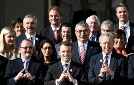French President Emmanuel Macron (centre) met with members of the International Olympic Committee (IOC) Evaluation Commission at the Elysee Palace in Paris, on May 16, 2017