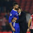 Chelsea's manager Antonio Conte embraces striker Diego Costa after their English Premier League match against Southampton, at St Mary's Stadium in Southampton, on October 30, 2016