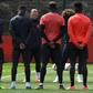 Manchester United players observe a minute's silence for the victims of yesterday's terror attack at the Manchester Arena, during a training session at the club's training complex near Carrington, on May 23, 2017