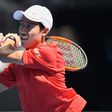 Kei Nishikori of Japan hits a return against Jeremy Chardy of France during their Australian Open second round match, in Melbourne, on January 18, 2017