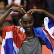 Britain's Mo Farah celebrates after winning the 5000m final during an indoor event in Birmingham, on February 18, 2017