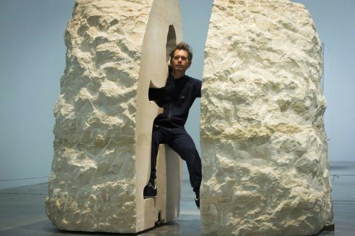 Abraham Poincheval has just enough room to sit up but has to pee into a bottle and store his own excrement around him