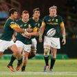 South African Morne Steyn (L) clears the ball during the test match against Australia at Loftus Versfeld Stadium on October 1, 2016 in Pretoria