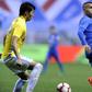 Shanghai Shenhua's Argentine striker Carlos Tevez (R) is in hot water after being spotted at Disneyland after missing a game with his Chinese club
