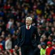Arsenal's French manager Arsene Wenger -- linked to the England coaching job -- had little to say on his position, other than to assure Arsenal fans he would not still be in charge in another 20 years' time