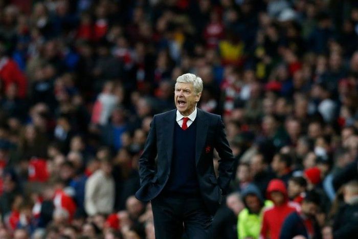 Arsenal's French manager Arsene Wenger -- linked to the England coaching job -- had little to say on his position, other than to assure Arsenal fans he would not still be in charge in another 20 years' time