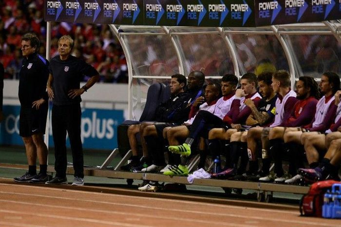 United States' players on the bench react during their 2018 FIFA World Cup qualifier football match against Costa Rica on November 15, 2016