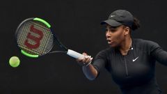Serena Williams hits a return during a practice session ahead of the 2017 Australian Open, in Melbourne, on January 14