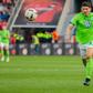 Wolfsburg's forward Mario Gomez runs with the ball against Bayer Leverkusen on April 2, 2017