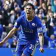 Leonardo Ulloa celebrates after netting a late equaliser for Leicester City against West Ham on Sunday, April 17