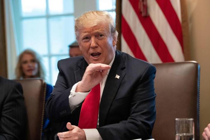 US President Donald Trump chairs a Cabinet meeting at the White House in Washington