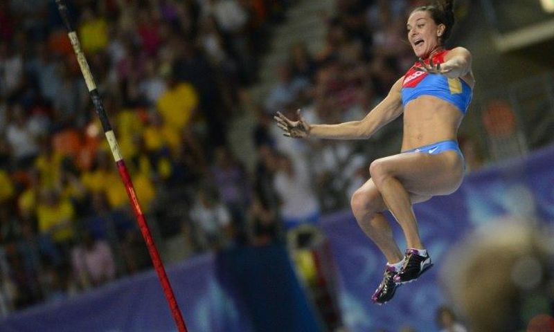 Russia's Yelena Isinbayeva celebrates as she clears the bar during the women's pole vault final at the 2013 IAAF World Championships at the Luzhniki stadium in Moscow on August 13, 2013
