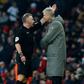 Arsenal's French manager Arsene Wenger (2nd left) is sent to the stands by English referee Jonathan Moss (left)during the English Premier League match between Arsenal and Burnley at the Emirates Stadium in London on January 22, 2017