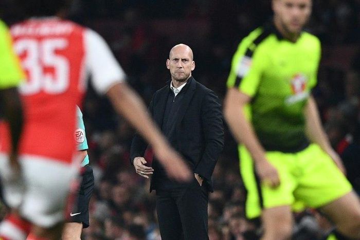 Reading's Dutch manager Jaap Stam watches from the touchline their English Football League Cup match against Arsenal, at The Emirates Stadium in London, on October 25, 2016