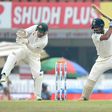 Indian batsman Cheteshwar Pujara plays a shot as Australian wicketkeeper Matthew Wade looks on on the fourth day of their third Test match, at The Jharkhand State Cricket Association (JSCA) Stadium Complex in Ranchi, on March 19, 2017