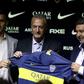 New Boca Juniors coach Gustavo Alfaro (center) poses with the team jersey alongside president Daniel Angelici (right) and sports director Nicolas Burdisso (left)