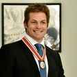 Former New Zealand All Blacks captain Richie McCaw speaks to the media after receiving the Order of New Zealand award, at Government House in Wellington, in April 2016
