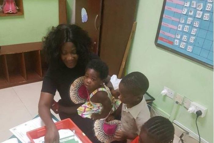 Mercy Johnson at her children's school