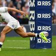 England's centre Jonathan Joseph scores a try during their Six Nations rugby union match against Scotland, at Twickenham stadium in south-west London, on March 11, 2017