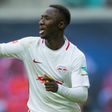 Leipzig's midfielder Naby Keita celebrates after scoring the second goal on October 23, 2016