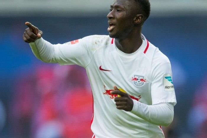Leipzig's midfielder Naby Keita celebrates after scoring the second goal on October 23, 2016