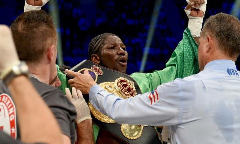 Hassan N'Dam (C) wins the World Boxing Association middleweight title on a split decision despite having been knocked down by Ryoya Murata