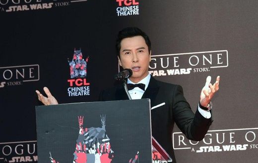 Martial arts actor Donnie gestures while speaking at his Hand and Foot prints ceremony in front of the TCL Chinese Theater on November 30, 2016 in Hollywood, California