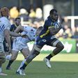 Clermont's flanker Peceli Yato (C) runs with the ball for a try during the European Champions Cup rugby union match against Exeter Chiefs on January 21, 2017