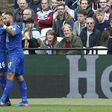 Leicester City's midfielder Riyad Mahrez (C) celebrates with striker Jamie Vardy (L) and defender Danny Simpson after scoring during the English Premier League football match against West Ham United March 18, 2017