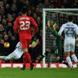 Liverpool's Welsh striker Ben Woodburn (L) scores his team's second goal during the English League Cup quarter-final football match between Liverpool and Leeds United at Anfield in Liverpool, north west England on November 29, 2016