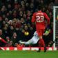 Liverpool's Welsh striker Ben Woodburn (L) scores his team's second goal during the English League Cup quarter-final football match between Liverpool and Leeds United at Anfield in Liverpool, north west England on November 29, 2016
