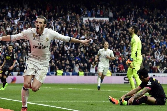 Real Madrid's Gareth Bale celebrates a goal during their Spanish league match against RCD Espanyol at the Santiago Bernabeu stadium in Madrid on February 18, 2017